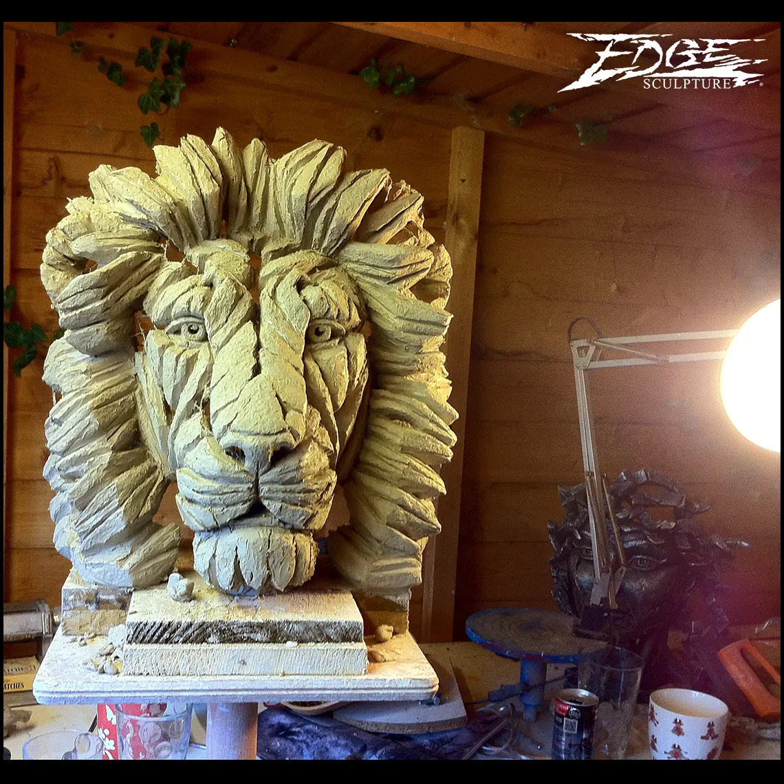 Matt shed sculpting lion bust