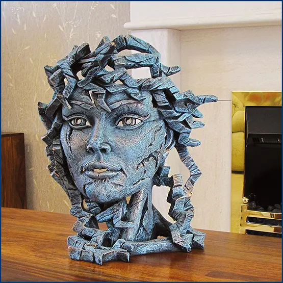 A picture of a fully painted Venus sculpture in a home