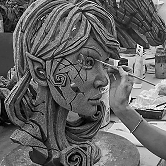 An Elf bust being expertly painted