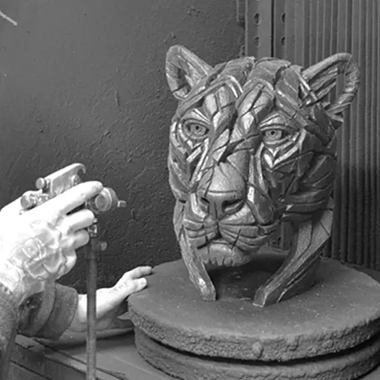 Spray booth with a Panther being sprayed